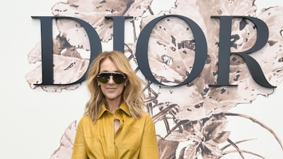 Celine Dion, in mustard Dior leather, attends the Christian Dior haute couture autumn /winter 2017-2018 show at Paris Fashion Week on July 3, 2017. Getty Images