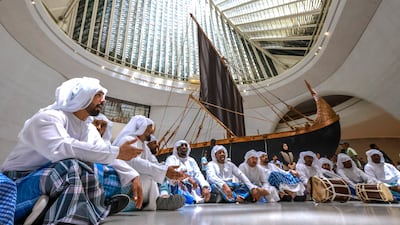 Performers at the Zayed National Museum in Abu Dhabi perform Al Nahma, a traditional Emirati maritime chant performed by pearl divers and fishermen. Victor Besa / The National