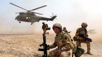 British soldiers during the Iraq War. The 2003 US-led invasion exemplified a disregard for international law. PA
