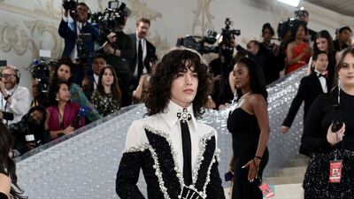 Conan Gray pays homage to Lagerfeld's signature style. AFP