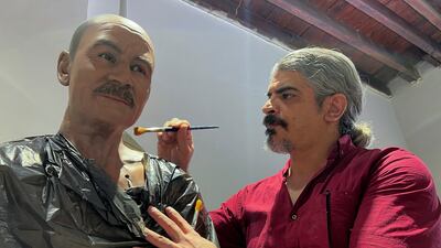 An artist works on semi-assembled wax figures to be displayed in a new museum in Basra, Iraq June 12, 2023. REUTERS / Mohammed Aty