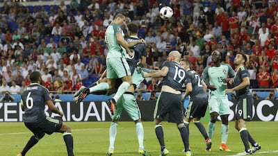 Portugal’s Cristiano Ronaldo scores their first goal against Wales in the Euro 2016 semi-final in Lyon. Carl Recine / Reuters