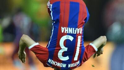 Bayern Munich defender Rafinha jumps to celebrate winning the German Cup final on Saturday over Borussia Dortmund. Patrik Stollarz / AFP / May 17, 2014