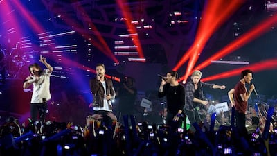 One Direction – l-r: Harry Styles, Liam Payne, Zayn Malik, Niall Horan and Louis Tomlinson – perform at the “40 Principales” awards ceremony at the Barclaycard Center in Madrid, Spain on December 12, 2014. Carlos Alvarez/Getty Images