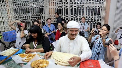 Aisha Rotti bakery provides participants interactive subject matter so they can practice their photography skills on the go, including camera settings and composition relevant to street photography. Pawan Singh / The National