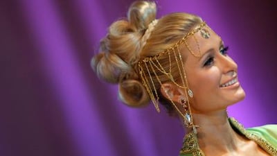 US socialite Paris Hilton smiles during a press conference in Dubai on June 17, 2009.