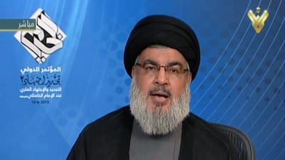 Hassan Nasrallah, the head of Hizbollah, is pictured here on June 10, 2015, giving a televised address from an undisclosed location in Lebanon. During the address Mr Nasrallah announced that the powerful Shiite movement had begun to fight ISIL. Al Manar/Handout/AFP Photo