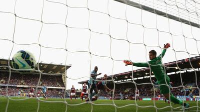 Diafra Sakho of West Ham United heads the opening goal past Tom Heaton of Burnley during West Ham's Premier League victory on Saturday at Turf Moor. Alex Livesey / Getty Images