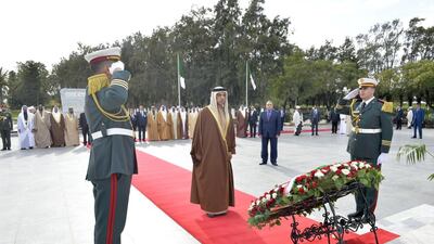 Sheikh Mansour lays a wreath on a tomb and reads a prayer for those who died during the Algerian war of independence, and the former presidents of Algeria.