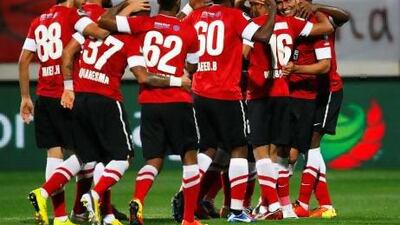 The Chilean Luis Jimenez, second from right, enjoys good rapport with his teammates, including the local players, at Al Ahli. Jake Badger for The National
