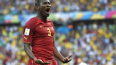 Asamoah Gyan celebrates scoring Ghana's second goal in a 2-2 draw with Germany on Saturday at the 2014 World Cup in Fortaleza, Brazil. Laurence Griffiths / Getty Images / June 21, 2014