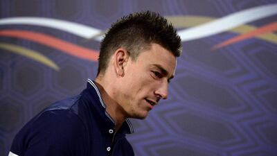 Laurent Koscielny arrives at a press conference on Saturday as France prepare to play Nigeria in the round of 16 at the 2014 World Cup on Monday. Franck Fife / AFP / June 28, 2014
