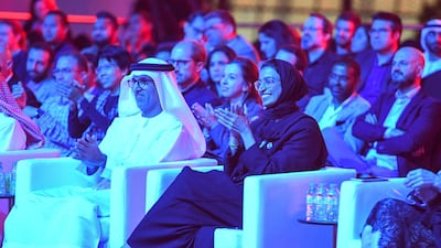 Mugheer Khamis Al Khaili, chairman of the Department of Community Development, and Noura Al Kaabi, Minister of Culture and Knowledge Development, enjoying the performances