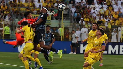 Al Wasl goalkeeper Muhammad Ali thwarts an Al Nassr attack. EPA