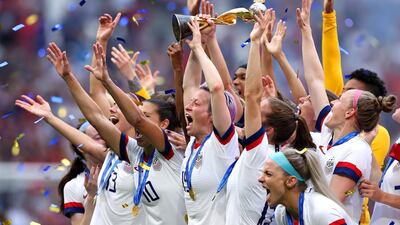 The US women's team lifting the FIFA Women's World Cup Trophy following their victory over The Netherlands. Alex Grimm / Getty Images