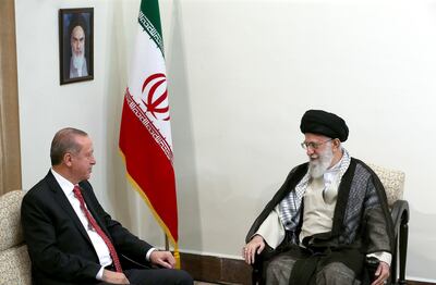 Iran's Ayatollah Ali Khamenei, right, with Turkey's Recep Tayyip Erdogan are pursuing deeply ideological projects in the Middle East. AP Photo