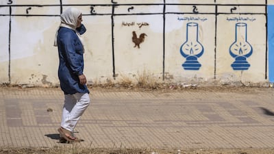 Numbers and symbols of political parties painted on a wall in Khemisset, Morocco. EPA