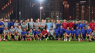 Sheikh Rashid bid Humaid Al Nuaimi, president of the FA, with the UAE national team squad and staff.