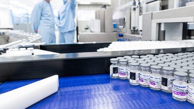 Employees at an AstraZeneca manufacturing plant. The London-listed firm supplied 2.5 billion doses of its Covid-19 vaccine last year. AFP