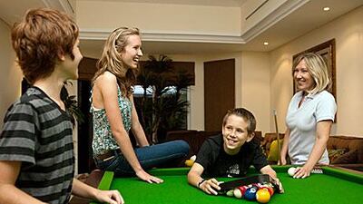 From left: Brody, Delaney, Cutter and Daniele Aarhaus at their family home in the Green Community, Dubai.