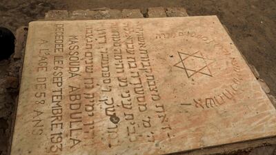 Inscriptions in the Hebrew alphabet and English on a grave at the Jewish cemetery in Khartoum. AFP