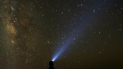Elsewhere in Egypt, a man uses a light on his head to monitor the Milky Way in the natural reserve area of Wadi Al Hitan, or the Valley of the Whales, in Al Fayoum governorate, south-west of Cairo, on August 12, 2015. Amr Abdallah Dalsh / Reuters
