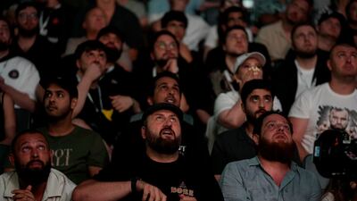 Fight fans inside Etihad Arena watch the heavyweight clash between Alonzo Menifield and Azamat Murzakanov.