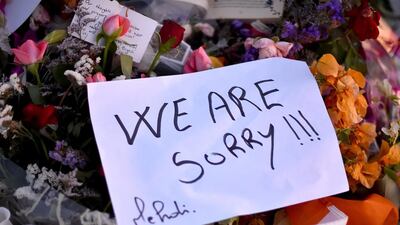 Flowers and tributes are left at Tunisia's Marhaba beach near to where 38 people were killed last week in a terrorist attack. Jeff J Mitchell / Getty Images