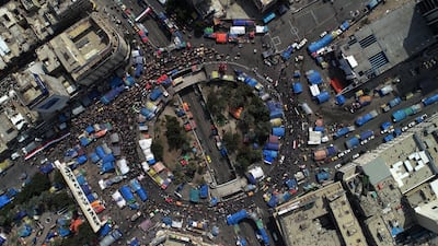 An aerial picture taken by a drone shows Iraqi protesters at the Al-Tahrir square in central Baghdad, Iraq. EPA