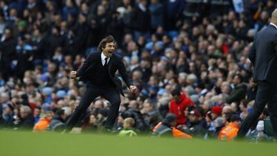 Chelsea manager Antonio Conte celebrates the third goal as Manchester City manager Pep Guardiola also reacts on Saturday. Phil Noble / Reuters / December 3, 2016