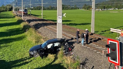 Austrian police examine the crossing where a Saudi man and his child were killed on Wednesday when a train collided with their car. Photo: @AlShareef700 / Twitter