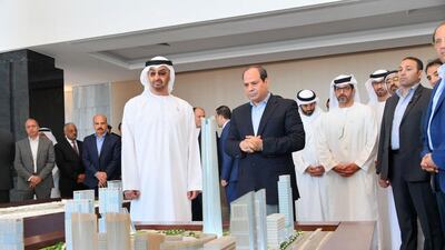 Crown Prince of Abu Dhabi and Deputy Supreme Commander of the UAE Armed Forces Sheikh Mohamed bin Zayed views plans for Egypt’s under construction resort city of New Alamein during a tour with President Abdel Fattah El Sisi on March 28, 2019. Egyptian Presidency HO