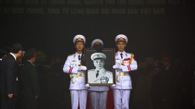 Soldiers carry a portrait of General Vo Nguyen Giap during his funeral at the National Funeral House in Hanoi, Vietnam. The general was a key figure in securing Vietnam’s independence. Luong Thai Linh / EPA