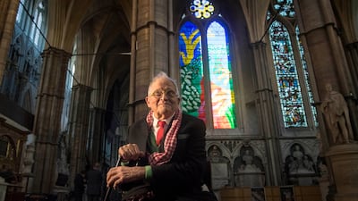The artist in front of The Queen's Window, which he designed, at Westminster Abbey, London, in 2018. The contemporary stained-glass design celebrates the reign of Queen Elizabeth II. PA