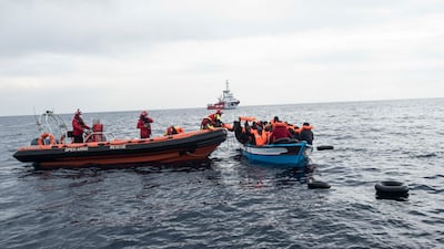 The Open Arms NGO rescues refugees from Africa and Magreb from a boat about 45 nautical miles off Libya's coast in March 2022. AP