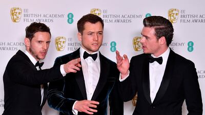 Actors Jamie Bell, Taron Egerton and Richard Madden pose in the winners' room at the British Academy Film Awards 2019. AFP