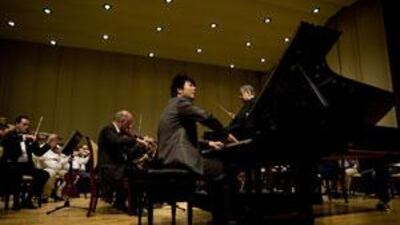 Lang Lang performs with the Vienna Philharmonic and the conductor Zubin Mehta. Rich-