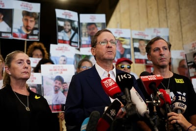 Israeli President Isaac Herzog visits Hostages Square in Tel Aviv, the day before the expected release of captives by Hamas. Reuters
