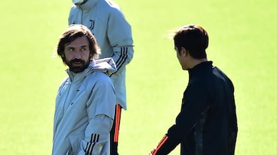 Andrea Pirlo with Paulo Dybal. Reuters