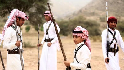 Men and boys during a traditional desert trip near the western Saudi city of Taif. Mohamed Al Hwaity / Reuters