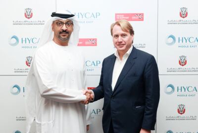 Arafat Al Yafei, executive director of the Added's Industrial Development Bureau and Jo Bamford, chairman and founding partner of Hycap Group. Photo: Added