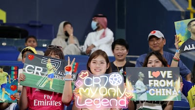 Al Nassr fans display Cristiano Ronaldo banners before the match. Reuters