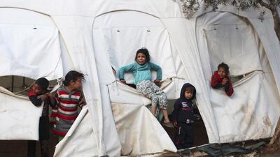 Syrian refugee children in the camp at Akkar in northern Lebanon as a powerful winter storm sweeps in from Turkey. Reuters