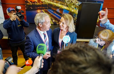 Reform UK leader Nigel Farage with Sarah Pochin, who won the Runcorn and Helsby by-election for the party. PA