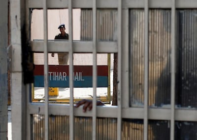 A policeman walks inside Tihar Jail in 2013. Reuters