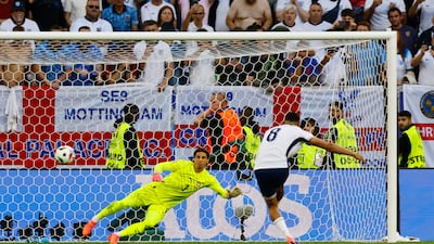 England's Trent Alexander-Arnold scores the winning penalty in the shoot-out. Reuters