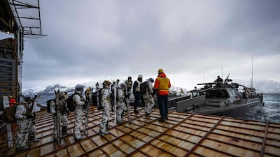 Marines from France and Finland board a fast assault ship during military drills near Sorstraumen, above the Arctic Circle in Norway. AFP