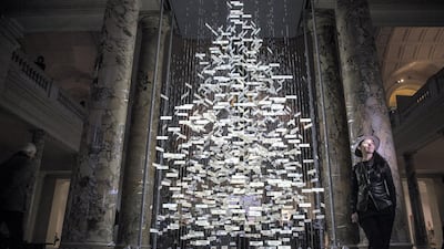 Es Devlin poses beside a 'Christmas Tree' in the entrance to the Victoria and Albert museum in London, England. Getty Images