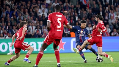 Desire Doue scores scores opening goal for PSG via a wicked deflection. EPA