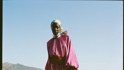 Dess, Dh7,475, Roksanda at The Modist. Scarf, Dh1,450, Hermes. Boots Dh2,750, Stuart Weitzman